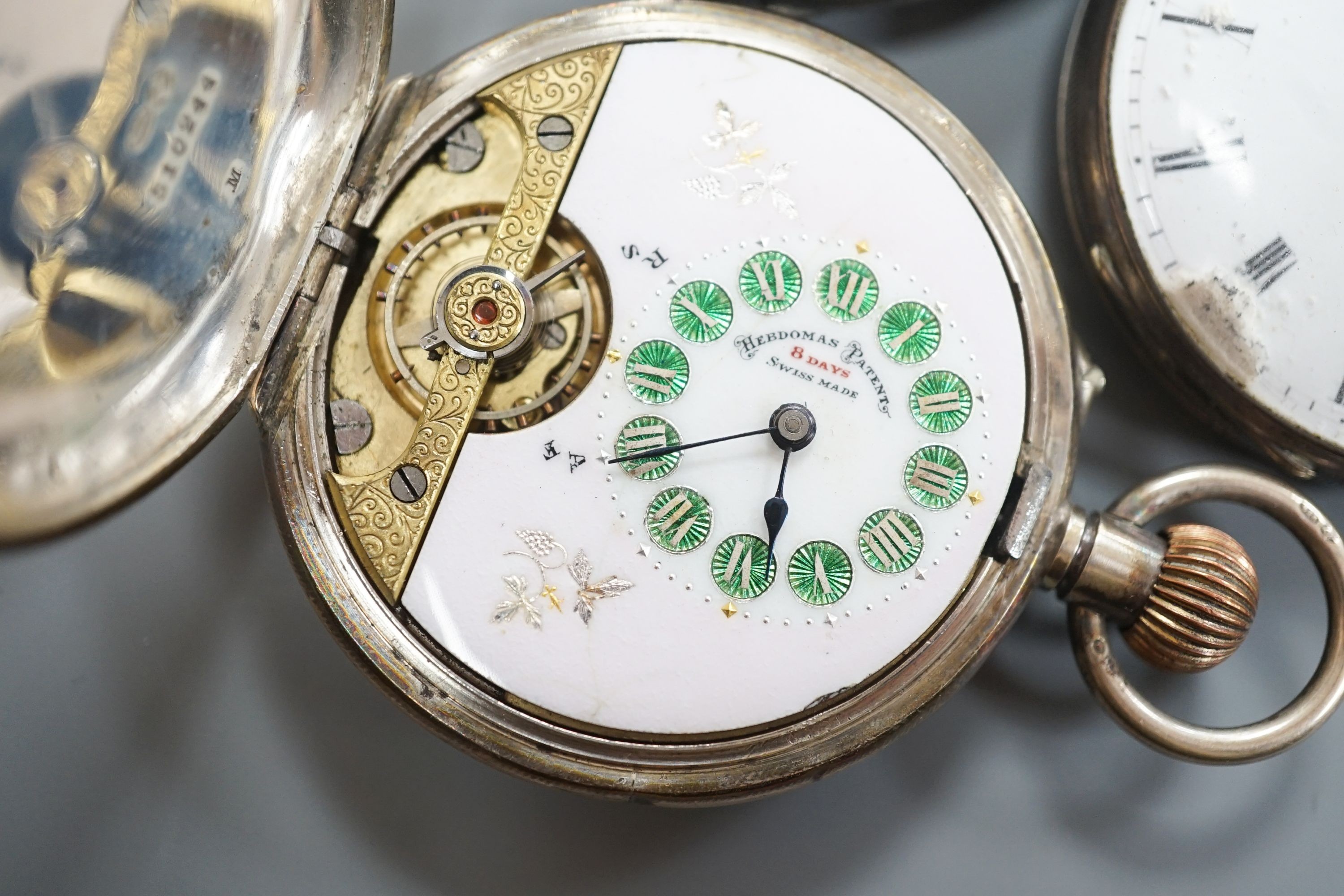 Six assorted late Victorian and later silver or white metal pocket watches, including J.W. Benson.